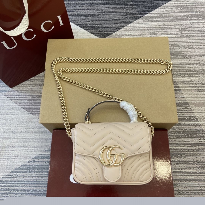 G*u*i top handle bags